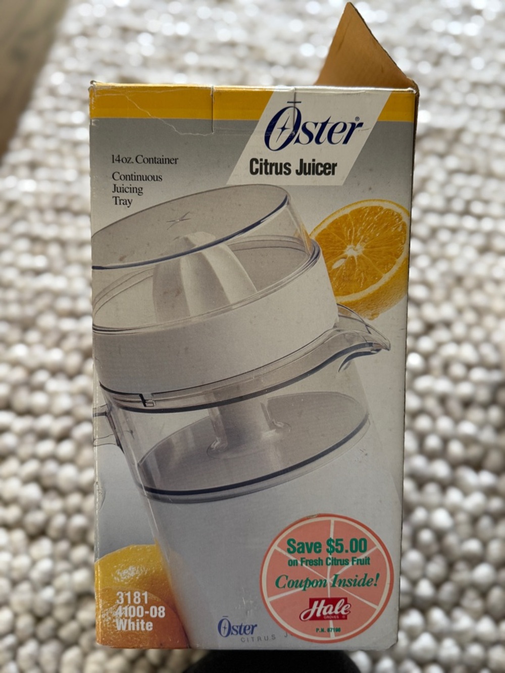 Oster White Citrus Juicer with Blue Logo